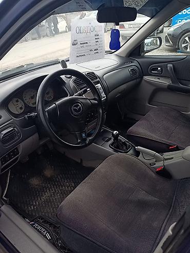 Mazda: Mazda 323: 2002 г., 1.6 л, Механика, Бензин, Хэтчбэк — 7