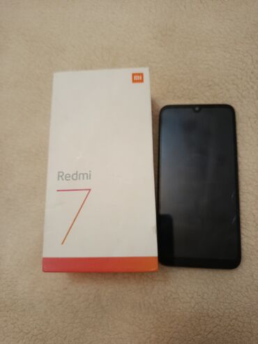 телефон fly fs526: Redmi Note 7, 64 ГБ, цвет - Черный