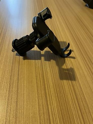 zaslonka nedir: Avtomobil üçün hava çıxışına taxılan telefon tutacağı. Stokda cəmi — 3