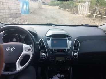 Радиаторы: Hyundai ix35 (salon və üst hissə görüntüləri) - Rul idarəetməsi
