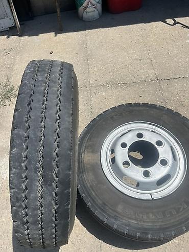 жёсткий тросс: Два грузовых колеса в сборе: диски + шины Kumho. Характеристики: - — 2