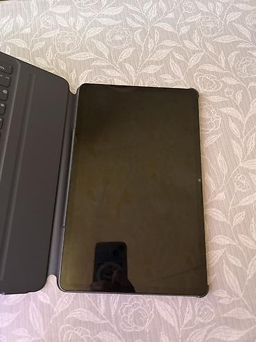 honor pad 10: HONOR planşet + maqnitli klaviaturalı kitabça-tipli örtük - Model — 7