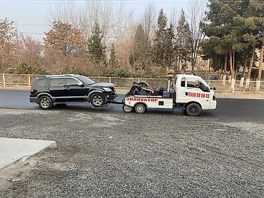 Услуги эвакуатора: По городу днем 2000 сом . Эвакуатор на базе Kia Bongo III. Услуги: - — 10