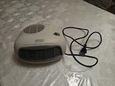 delonghi: Delonghi elektrik fan qızdırıcısı - Kompakt stolüstü/yerüstü dizayn - — 1