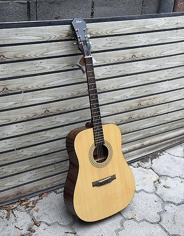 бир: Акустическая гитара Karok, форма корпуса Dreadnought. - Верхняя дека — 4