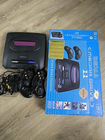 sega mega drive: SEDA 16-bit video oyun konsolu. Komplektə konsol, 2 ədəd pult, enerji — 2