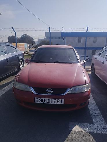 Opel: Opel Vectra B, qırmızı rəng, sedan/götürmə tipli kuzov (5 qapı) — 1