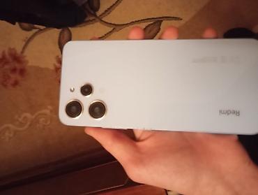 redmi 14 s: Redmi 12, 128 GB, rəng - Mavi, Barmaq izi — 2