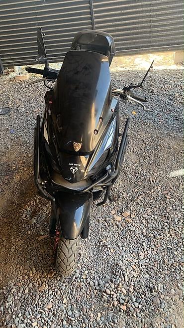 Унаа: Скутер ABS Moto (125–150 см³, вариатор) Черный городской скутер с — 1