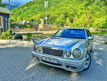 Mercedes-Benz: Mercedes-Benz E-Class: 2.4 l | 1998 il Sedan