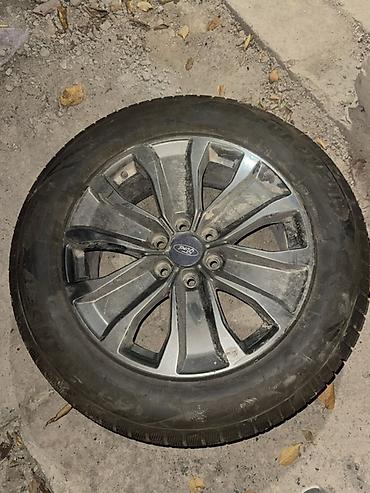 Дөңгөлөктөр монтажда: Диск Ford с шиной - Оригинальный литой диск Ford, 10‑спицевый, под 5 — 2