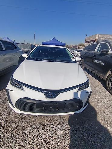 prius 2005: Toyota Corolla: 2021 г., 1.8 л, Вариатор, Гибрид, Седан — 1
