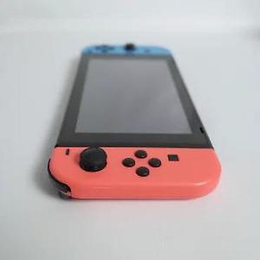 Nintendo Switch: U ponudi je Nintendo Switch. Stanje: lepo očuvana, manji tragovi — 20