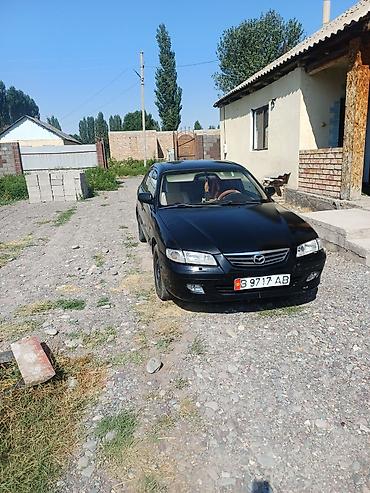 комбин: Mazda 626: 2000 г., 1.8 л, Механика, Бензин, Седан — 7