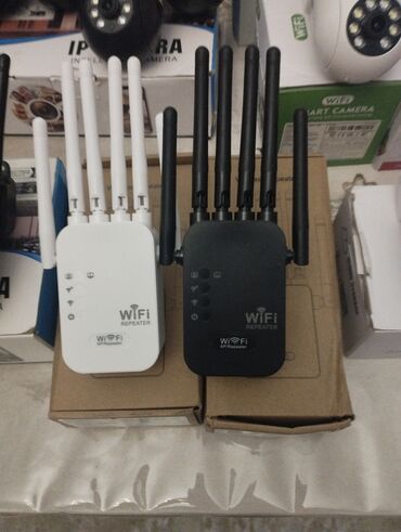 tv wifi qosmaq: Wifi guclendirici mesafeni coxaldir vifi catmayan noqtələr qədər