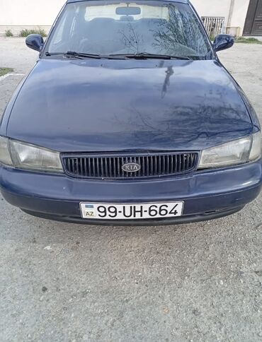 Tünd göy rəngdə Kia Clarus modeli, 1998, 2L