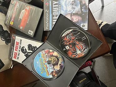 ps1 oyun: PlayStation 2 Slim komplekti Məzmun: - 2 ədəd Sony PlayStation 2 Slim — 3