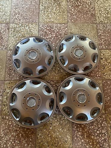 opel astra k: 4 ədəd gümüş rəngli təkər qalpakı (disk qapağı) dəsti. - Rəng — 2