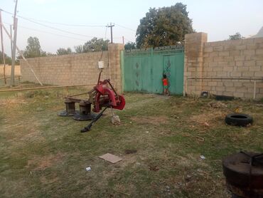 Traktorlar: Mavi rəngli T28. Qabaq təkərlər orta vəziyyətdə arxa təkərlər isə -da lalafo.az — 9 Traktorlar: Mavi rəngli T28. Qabaq təkərlər orta vəziyyətdə arxa təkərlər isə — 9