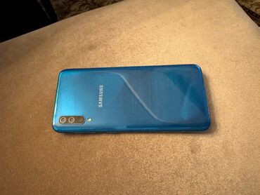 купить телефон раскладушку: Samsung A50s, 64 ГБ, цвет - Синий, Отпечаток пальца, Две SIM карты, Face ID