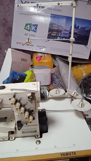 Промышленные швейные машинки: Распашивалка,5нитка