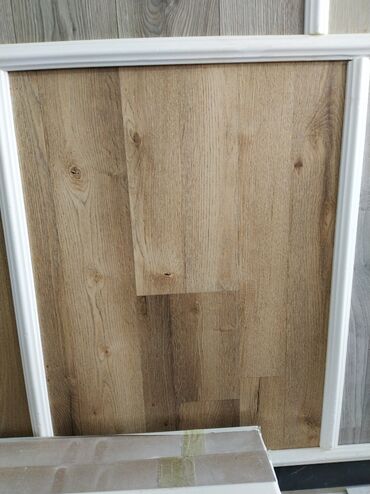 reyka taxta: Məhsul: Taxta teksturalı döşəmə örtüyü (laminat/PVC panel) Təsvir: -