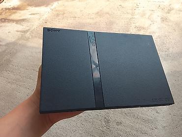 Sony PlayStation 2 Slim (PS2 Slim) oyun konsolu - Model: SCPH-7xxxx