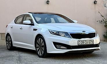 Kia: Kia Optima – ağ rəngli sedan Xarici xüsusiyyətlər: - Şık ağ kuzov — 3
