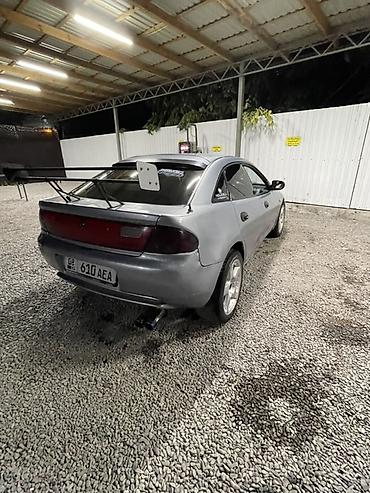 Унаа сатуу: Mazda Lantis: 1996 г., 1.6 л, Кол менен иштөөчү, Бензин, Седан — 2