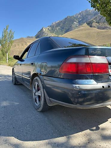 385 55: Mazda 626: 1997 г., 1.8 л, Механика, Газ, Седан — 5