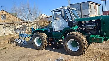 Другие тракторы: Трактор Т150 с оборотным плугом мала и арычник Характеристики и — 2