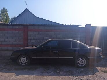 моноблоки мерс: Mercedes-Benz E‑Class седан (ориентировочно W210), черный цвет