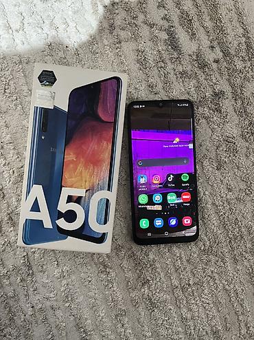 Samsung: Samsung Galaxy A50, 64 GB, rəng - Mavi, Barmaq izi, Face ID — 1