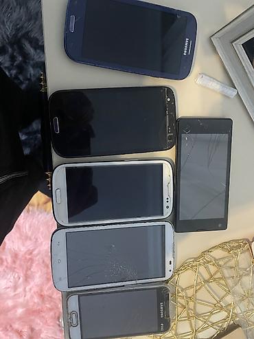 samsung gear s: Telefonlar detel olaraq satilir amma işlekdi ön ekran arxa ekran plata — 1