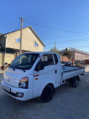 1000: Hyundai Porter II бортовой малотоннажный грузовик - Компоновка — 2