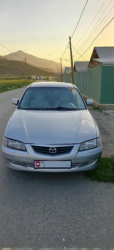 чехол на мопед: Mazda 626: 2000 г., 2 л, Механика, Бензин, Хэтчбэк — 1