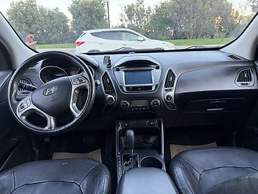 e60 guzgu: Hyundai ix35 Limited 4WD – gümüş rəngli şəhər/krosover. Texniki və — 7
