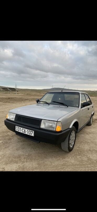 запчасти ваз 2107: Vaz 21099 tipli sedana bənzər, gümüşü rəngli 4 qapılı minik