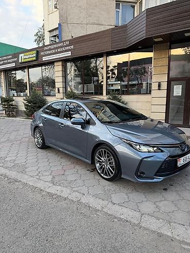 Toyota Corolla: 2023 г., 1.8 л, Автомат, Гибрид, Седан