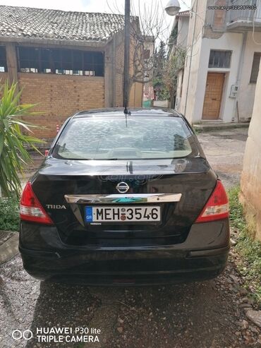 Οχήματα: Nissan Tiida: 1.6 l. | 2008 έ. Λιμουζίνα