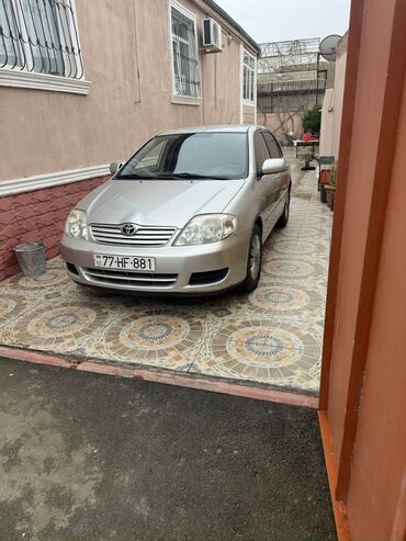 Toyota Corolla: 1.4 л | 2006 г. Седан