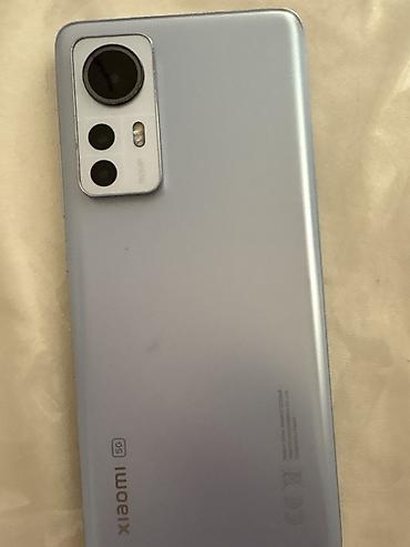 12x: Xiaomi 12X, 256 GB, rəng - Mavi, 
 Barmaq izi — 3
