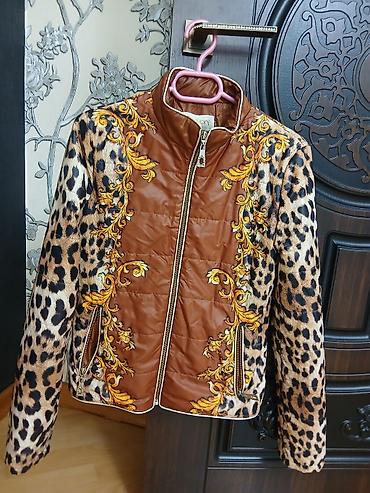 leopard: Qadın üçün zərif naxışlı qışlıq kurtka - Rəng və dizayn — 1