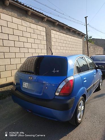 2003 ford transit: Kia Rio, mavi rəng, hetçbek kuzov. Texniki xüsusiyyətlər və təchizat — 4