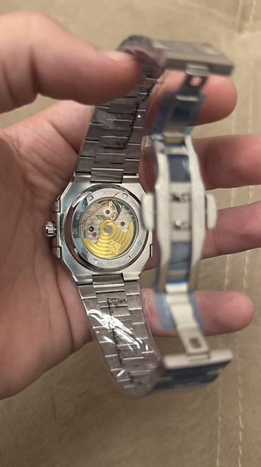 luc saat: Patek Philippe üslubunda kişi qol saatı - Korpus və qolbaq — 2
