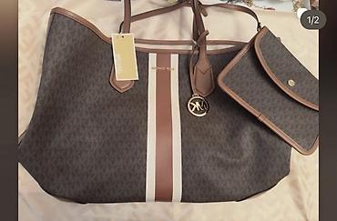 Michael Kors dəst – geniş tote çanta və uyğun klatç. Orjinaldir ve lalafo.az -da Michael Kors dəst – geniş tote çanta və uyğun klatç. Orjinaldir ve