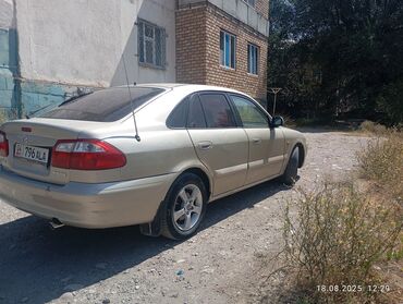 расрочкага машина берилет: Mazda 626: 2001 г., 1.8 л, Механика, Бензин, Хэтчбэк