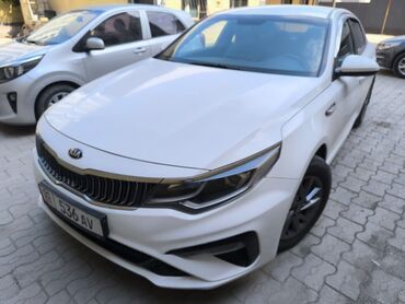 купить шины бу в бишкеке: Белый седан Kia К5, модель 2018 года, с элегантным и современным