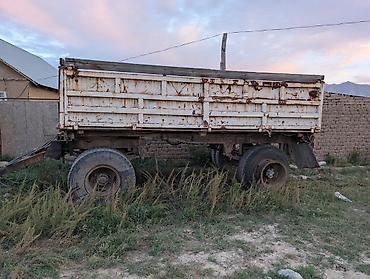 прицеп т 150: Одноосный/двухосный самосвальный прицеп для грузовика. Особенности: - — 1