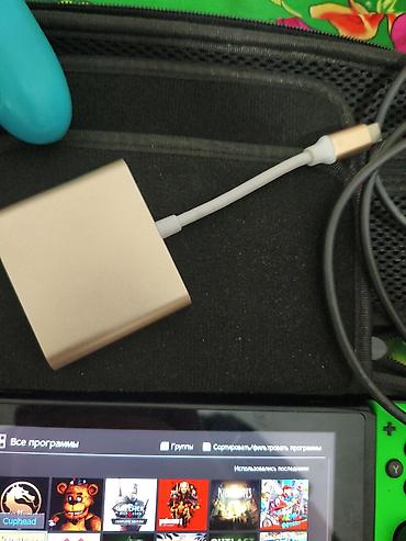 Nintendo Switch: Прошитый Нинтендо свич, есть недастатка маленькая царапина, левый — 4